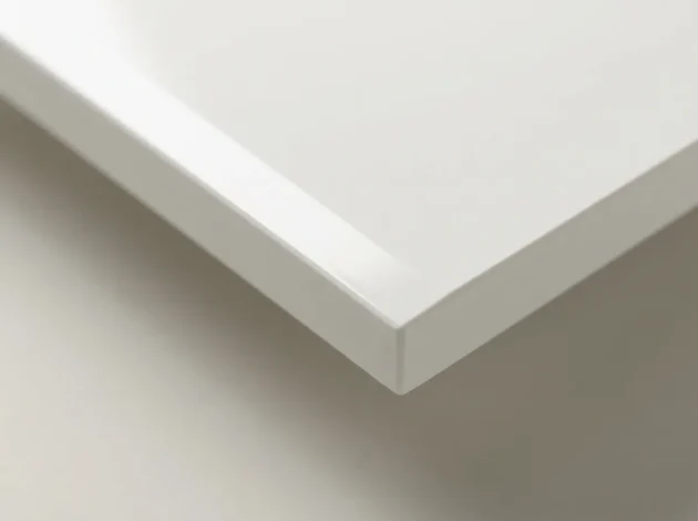 Close-up of the polished bevelled edge of a Pure White Quartz threshold